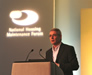 Paul Wenham presenting the award to Housing Solutions